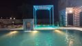 Pool with rain dance setup