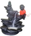 Baby on Stone Back Flow Smoke Fountain