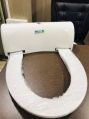 White plastic toilet seat cover