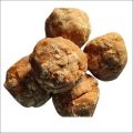 Solid brown sugarcane jaggery ball