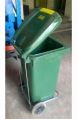 Green plastic wheel bins